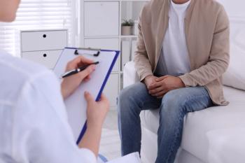 Man attending doctor's appointment | Image credit: New Africa - stock.adobe.com
