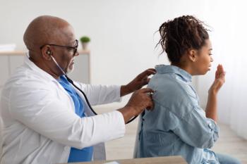 Patient coughing and doctor. | Image credit: @Prostock-studio_Adobestock.com