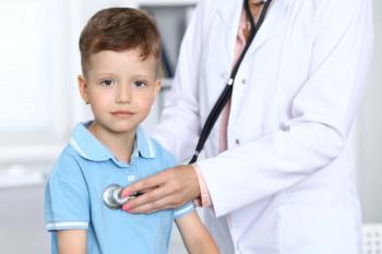 Young boy with doctor
