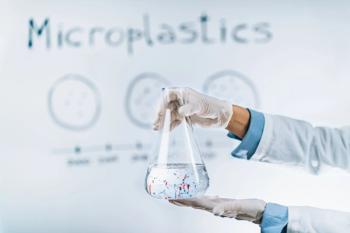 Microplastics in graduated erlenmeyer flask. | Image credit: Microgen – stock.adobe.com