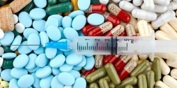 pills and syringe 