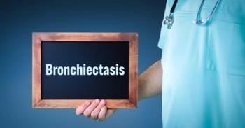 Doctor holding "bronchiectasis" board | Image Credit: MQ-Illustrations - stock.adobe.com