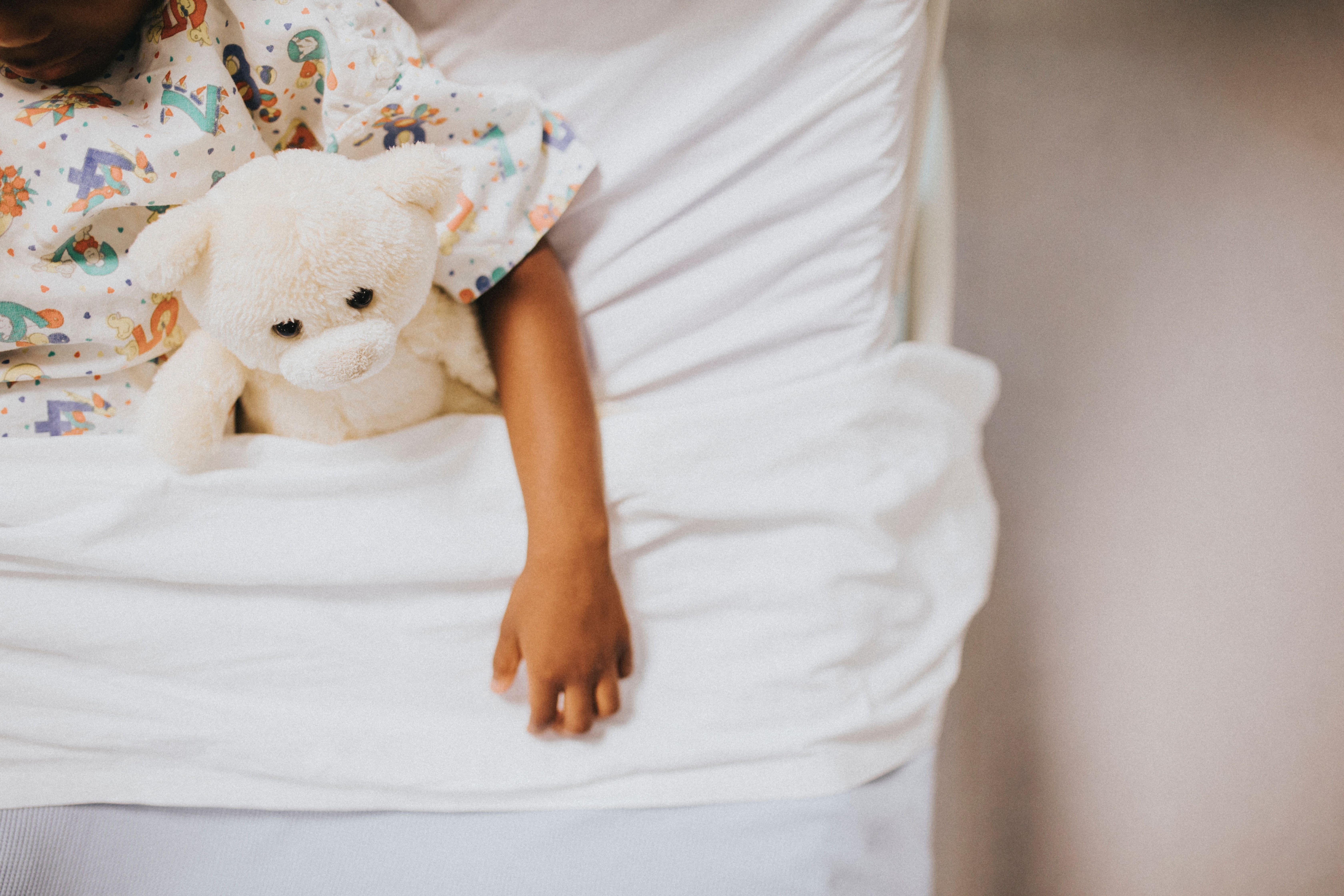 Child in a hospital bed.