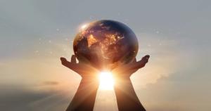 Human holding Earth | Image Credit: ©ipopba-stock.adobe.com