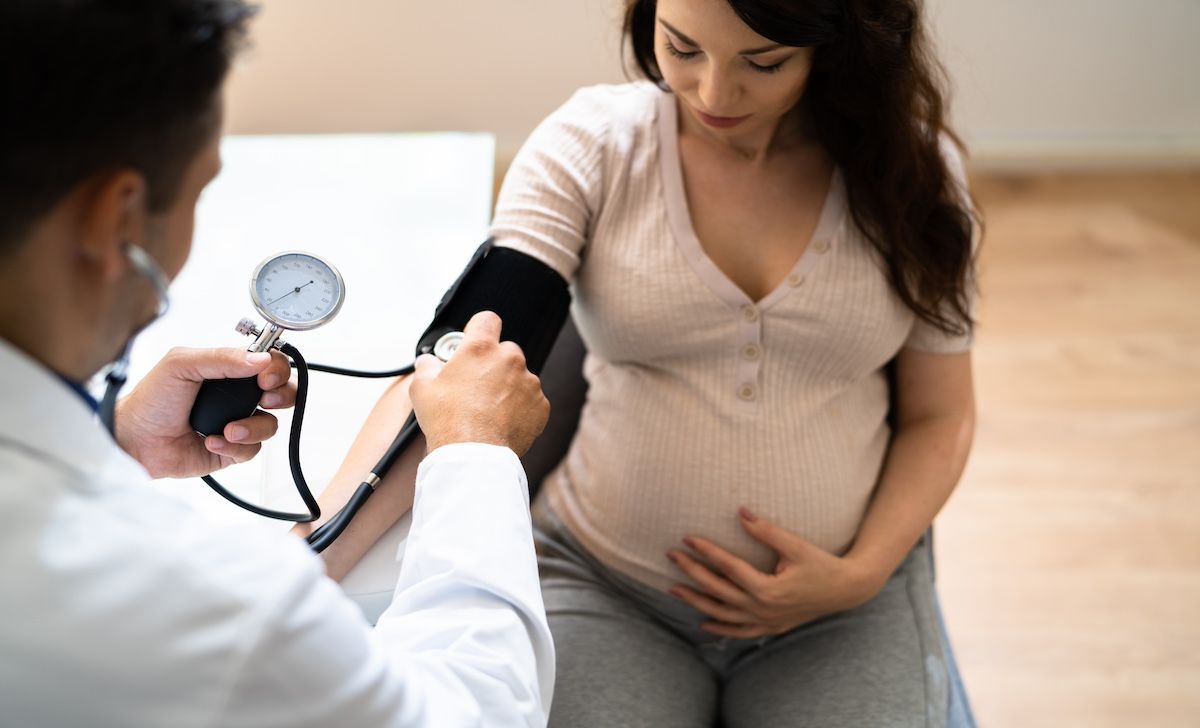 doc measuring BP in pregnany woman | Image Credit: Andrey Popov-stock.adobe.com.jpeg