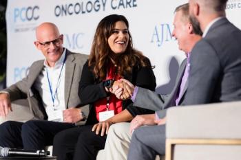 Zahra Mahmoudjafari, PharmD, MBA, BCOP, FHOPA greets fellow panelists | Image credit: Greg Smit for AJMC