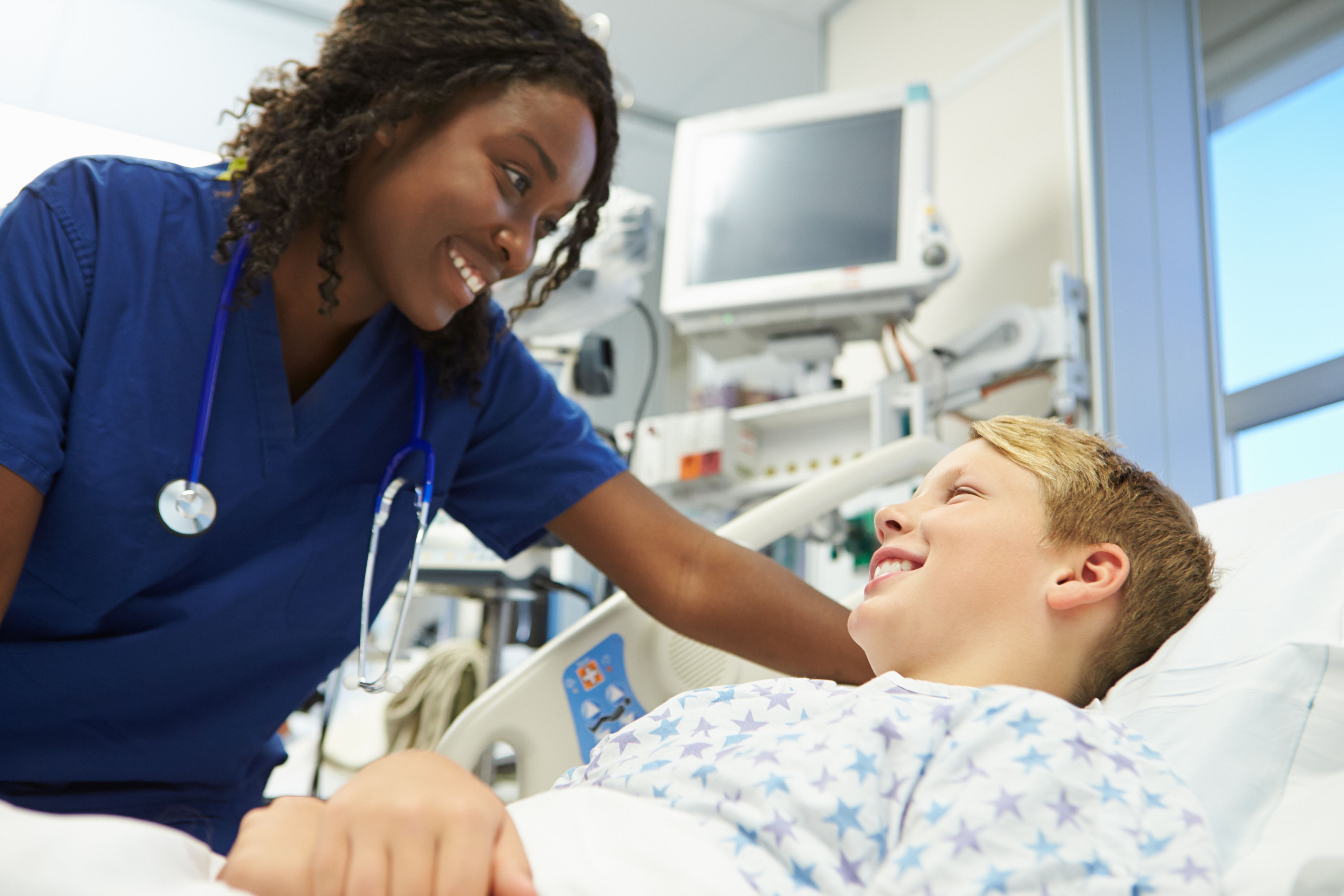 Boy in hospital bed