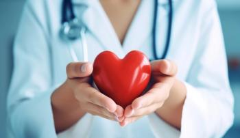 Doctor holding a heart | Image credit: Pana Studio - stock.adobe.com