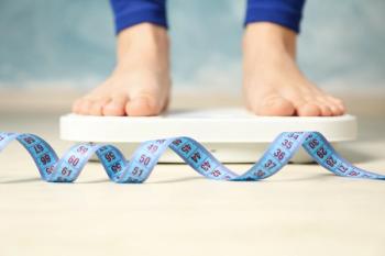 Woman stands on the scales. Measuring tape. Weight loss - Atlas - stock.adobe.com