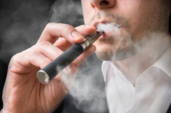 person smoking e-cigarette
