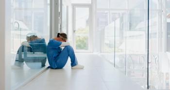Female health care employee suffering from burnout | Image Credit: D Lahoud/peopleimages.com - stock.adobe.com