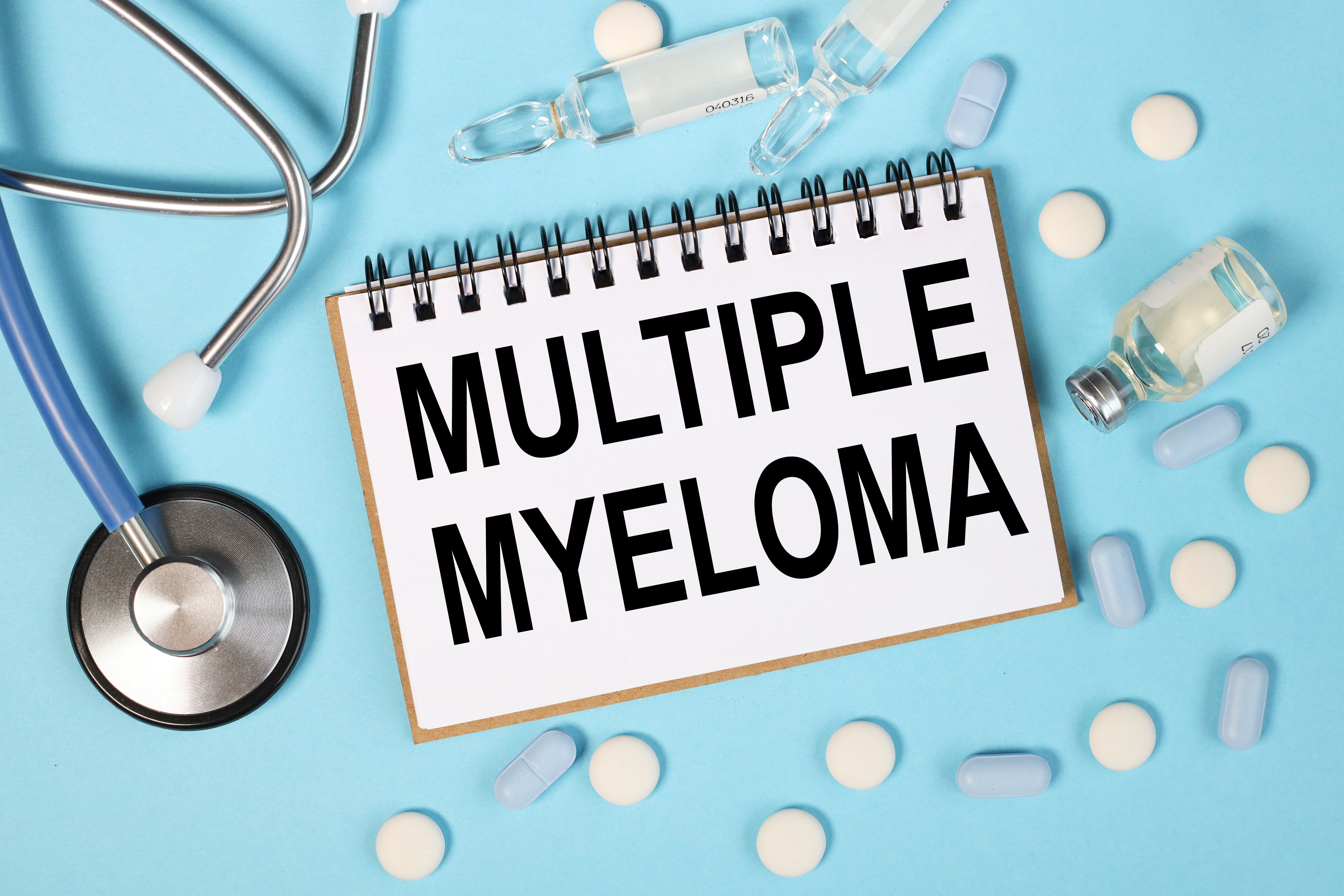 multiple myeloma, text on white paper near stethoscope on blue background | Image credit: Svetlana stock.adobe.com.jpeg