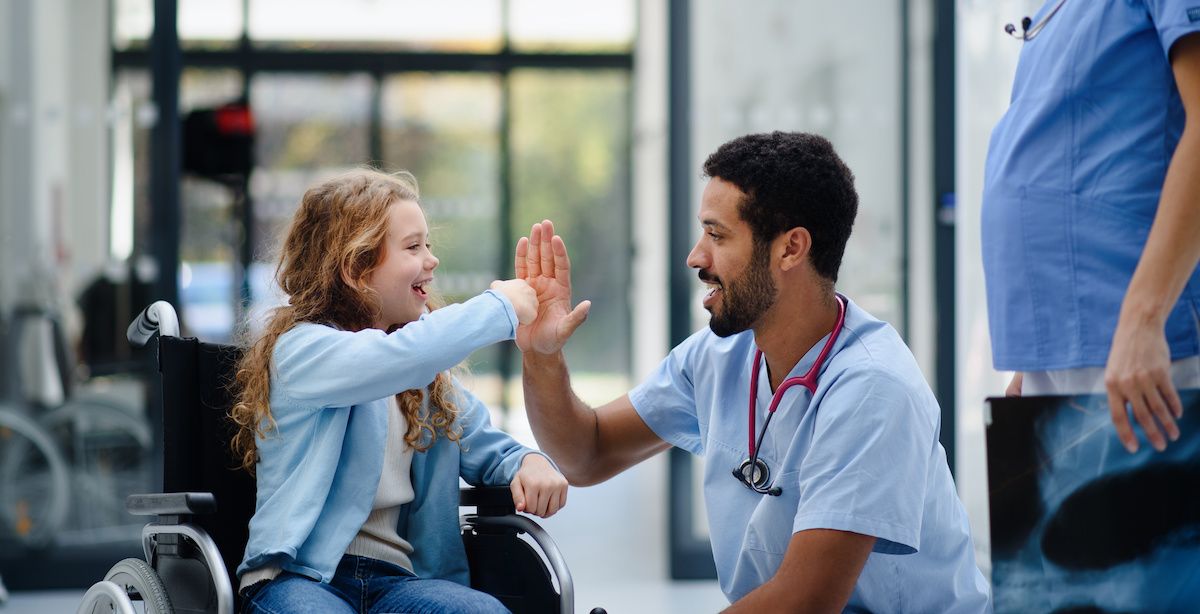 kid with MS and doctor | Image credit: Halfpoint - stock.adobe.com
