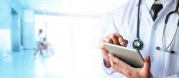 Doctor using digital technology | Image credit: otello-stpdc - stock.adobe.com