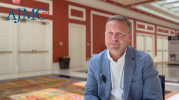 Joe DePinto, MBA, sitting for a video interview