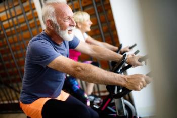 Older man on a stationary bike