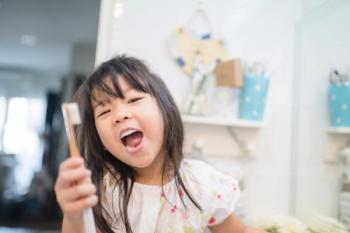 Girl Brushing Teeth | Image credit: MIA Studios - stock.adobe.com