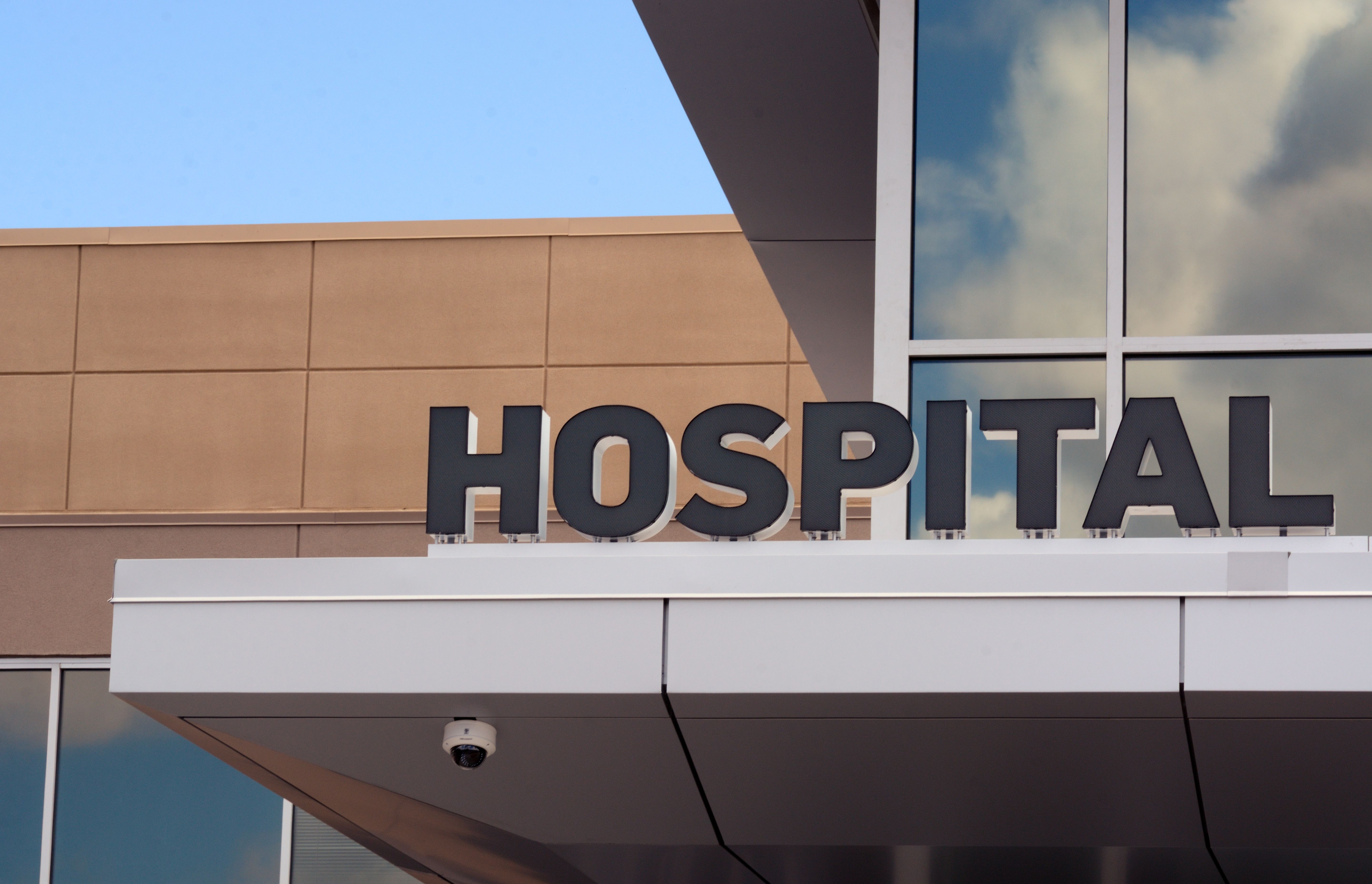 Hospital sign | Image credit: merrimonc – stock.adobe.com