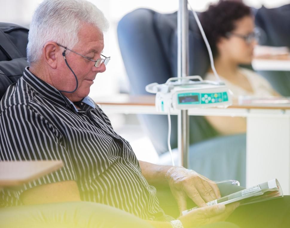 Man receiving infusion | Image credit: National Cancer Institute