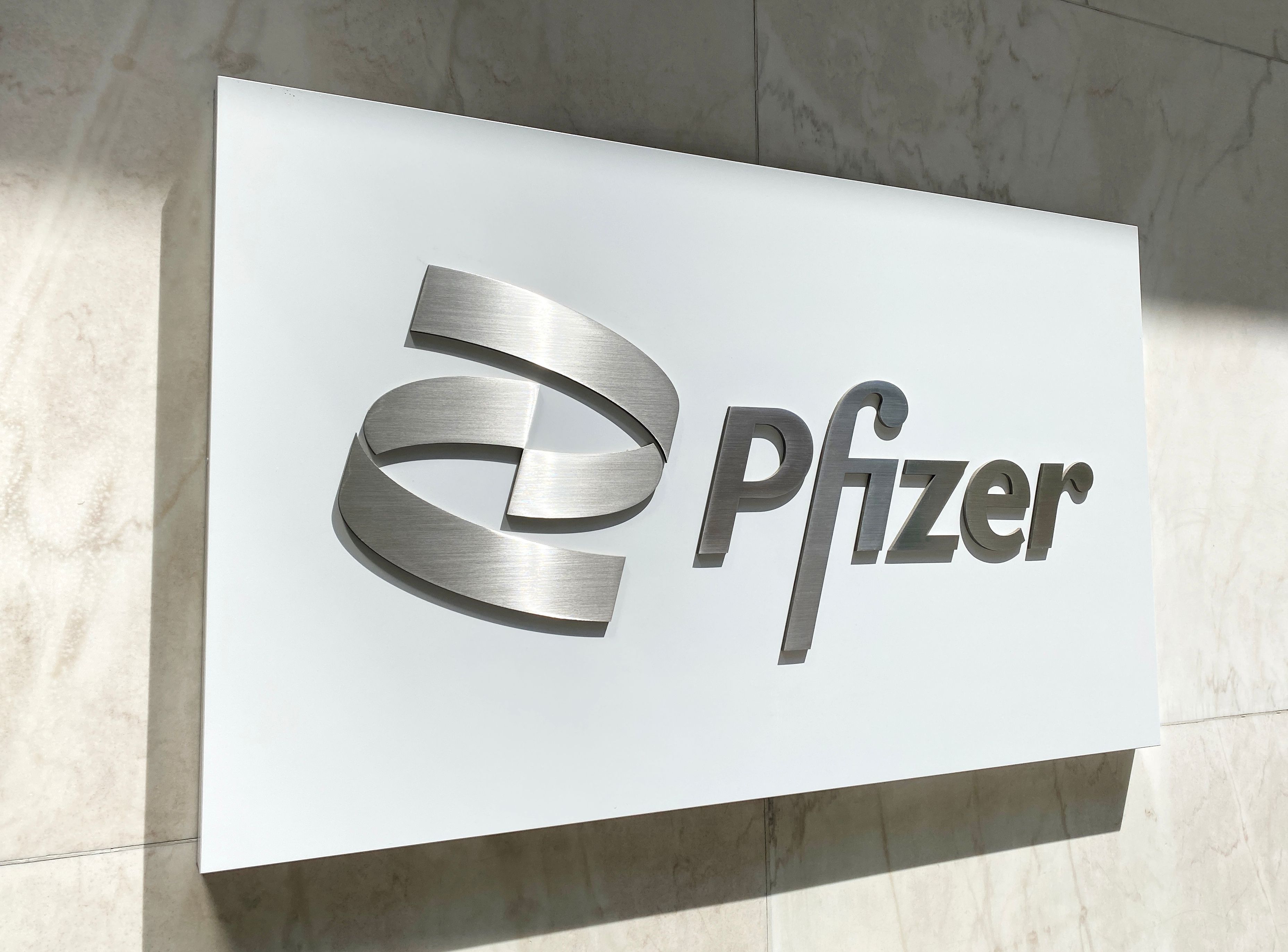 Pfizer logo on building | Image Credit: Kathy images - stock.adobe.com