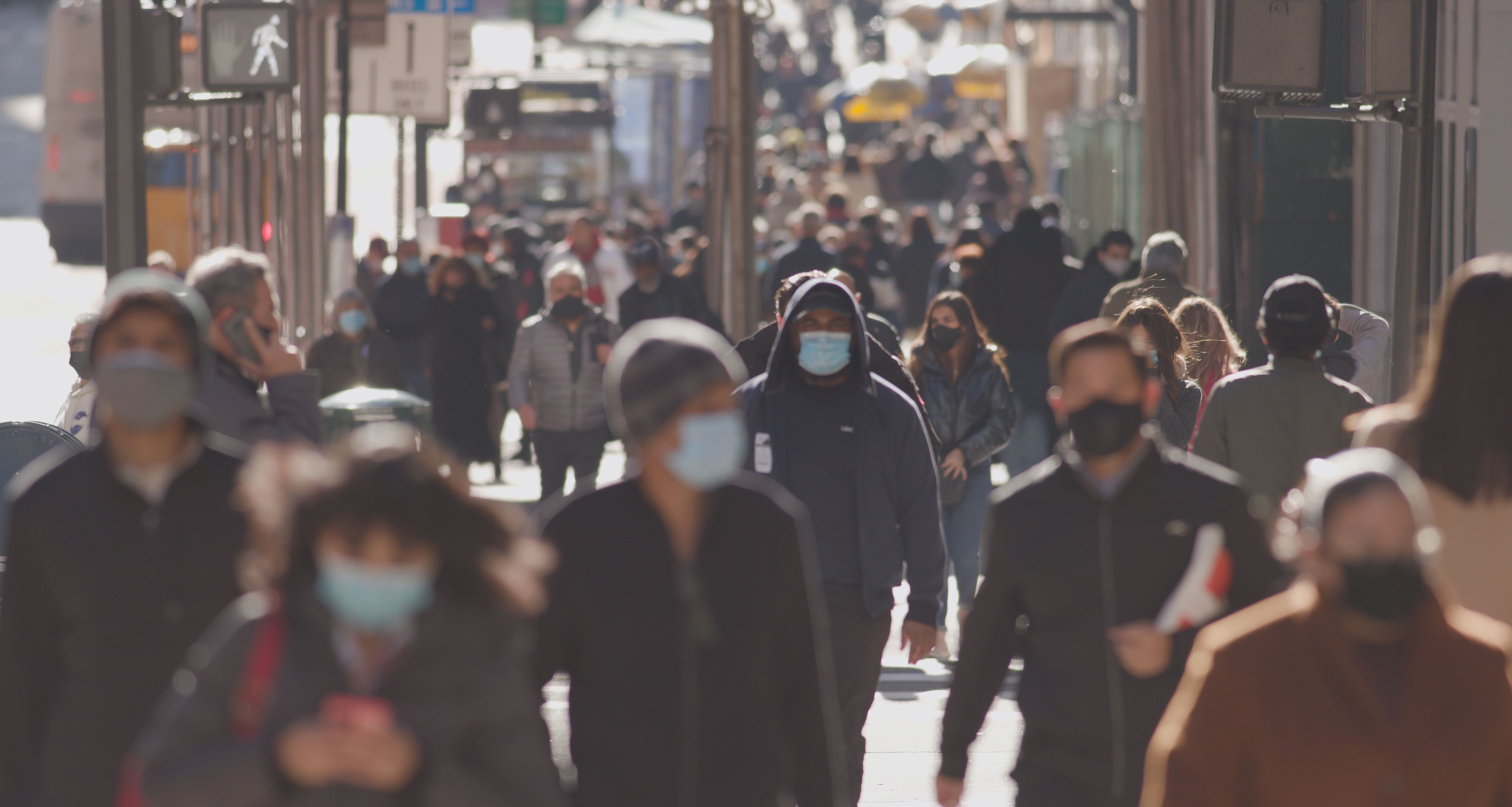 People walking with masks | Image credit: blvdone - stock.adobe.com