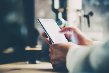 Person accessing content on phone.