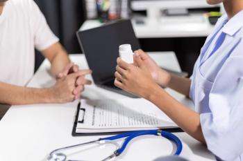 Pharmacist patient medication | Image Credit: © Wasan - stock.adobe.com