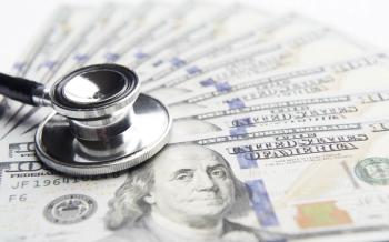 stethoscope on money