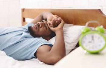 Black man with insomnia | Image Credit: © Prostock-studio-stock.adobe.com