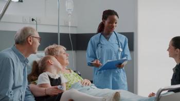 Doctor talking to patient and family | Image credit: DC Studio – stock.adobe.com