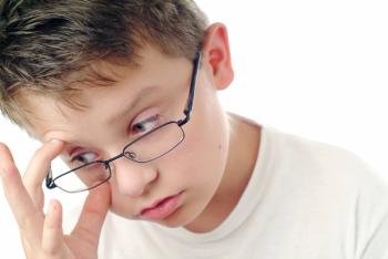 Child rubbing his eyes