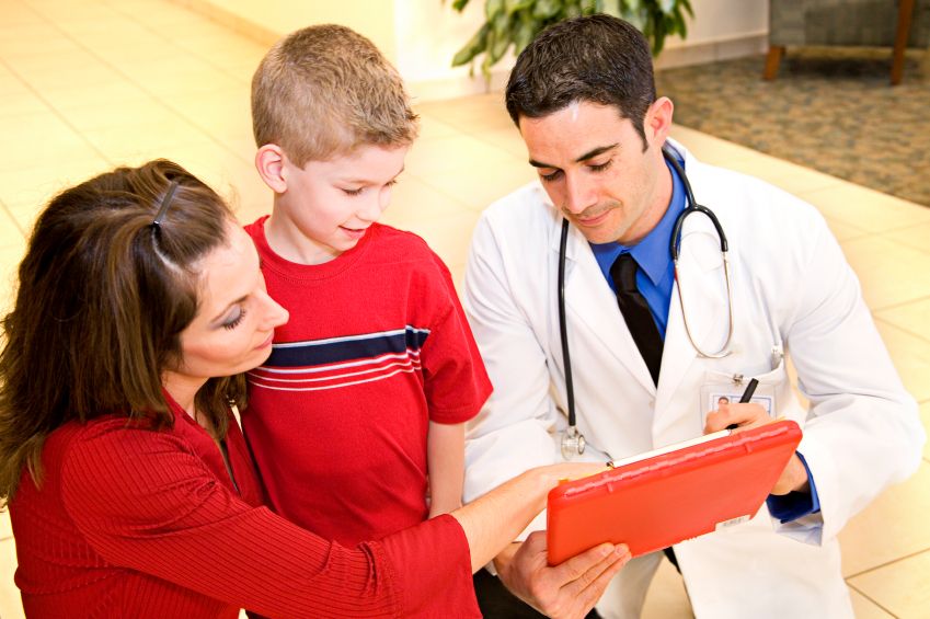 Child with mother and physician.