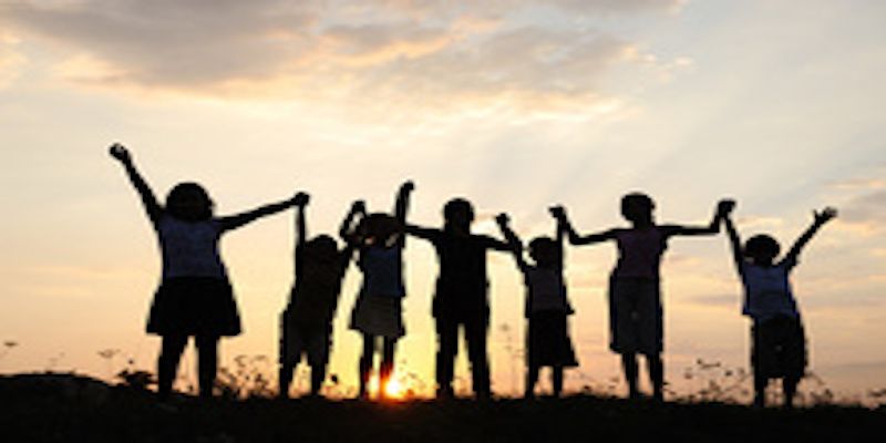 Silhouetted image of children