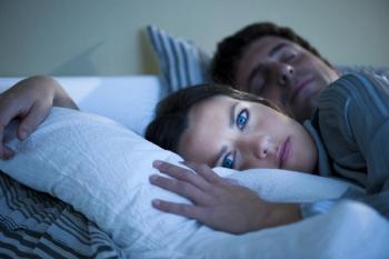 Picture of woman lying awake