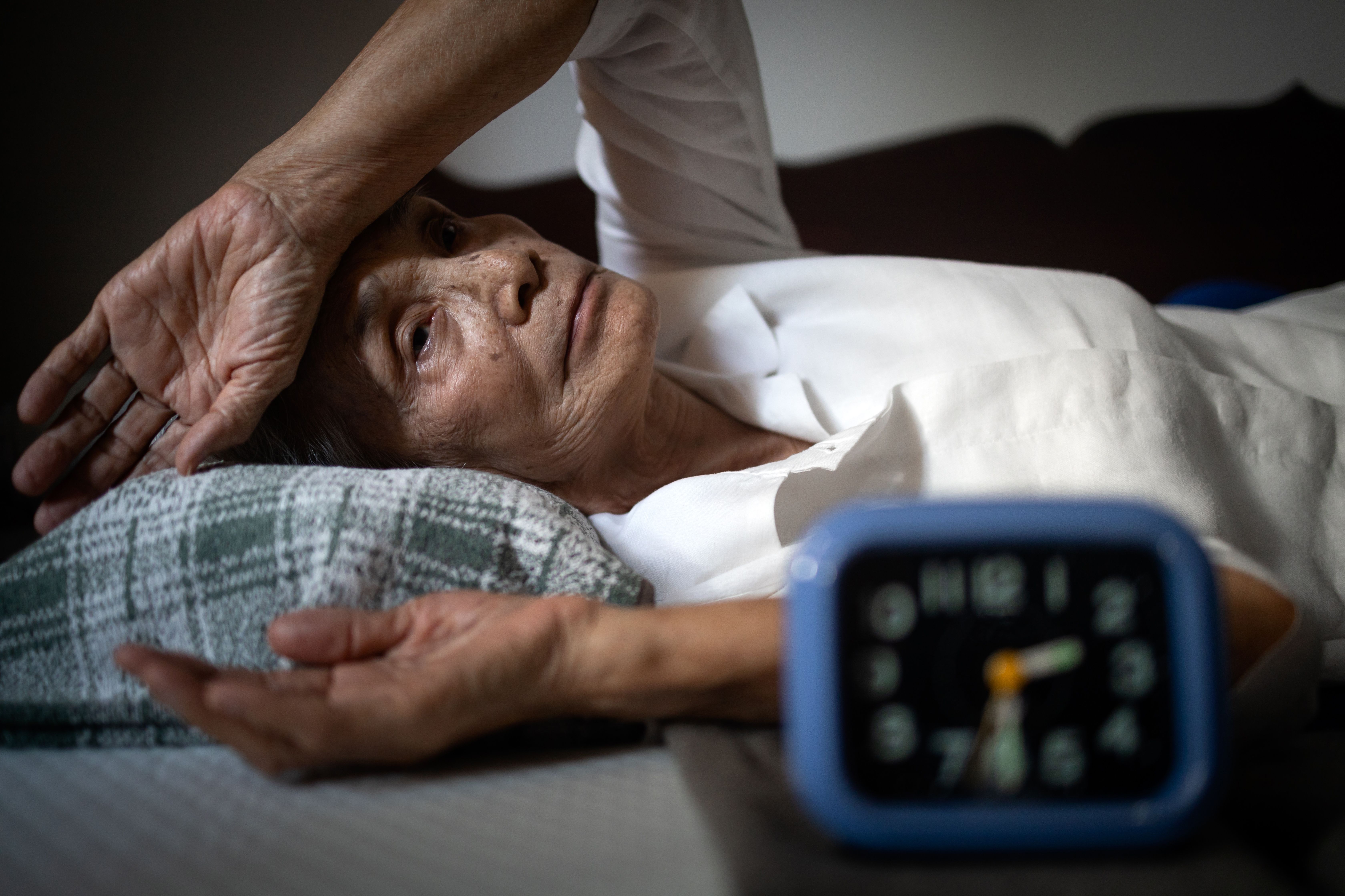 Elderly Asian Woman Having Trouble Sleeping | image credit: Satjawat - stock.adobe.com