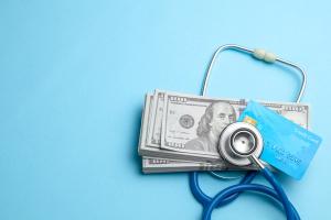 Cash money stethoscope cost - adragan - stock.adobe.com