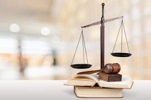 Gavel and scales of justice. | Image credit: @BillionPhotos_AdobeStock.jpeg