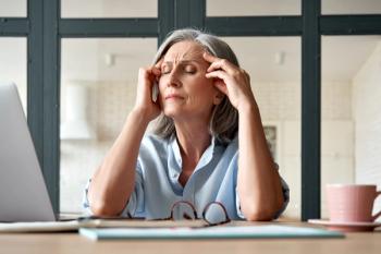 Mature woman with headache | Image credit: insta_photos – stock.adobe.com