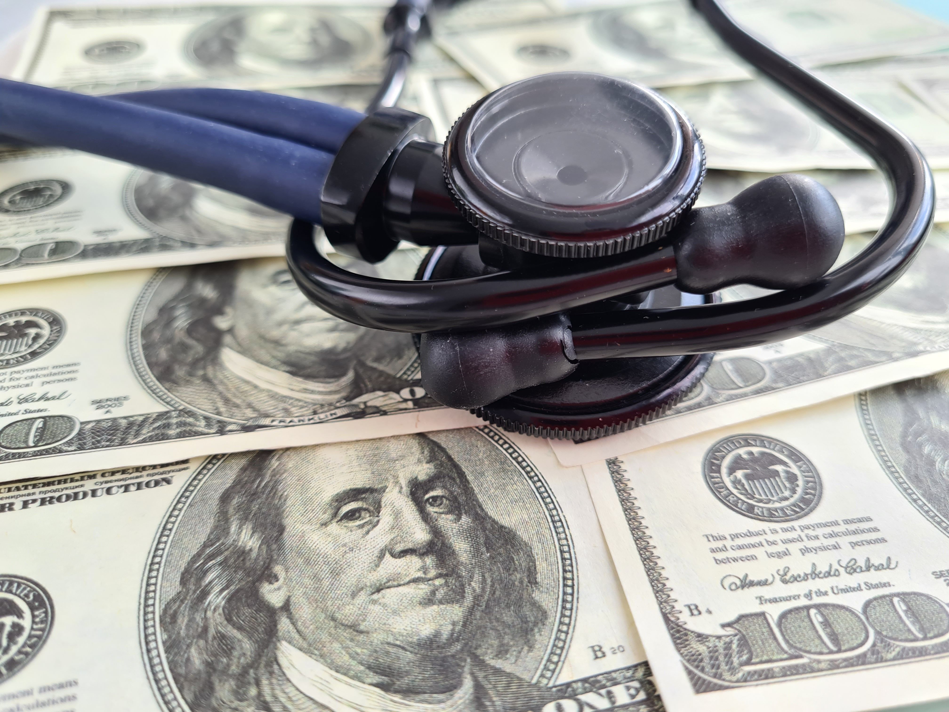 Stethoscope and money. | Image credit: Nadzeya- stock.adobe.com