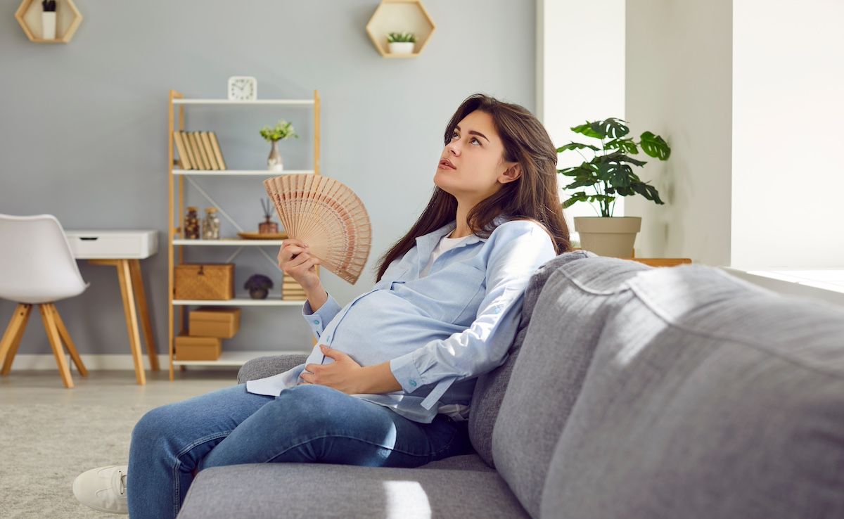 pregnant woman who is too hot| Image Credit: Studio Romantic-stock.adobe.com