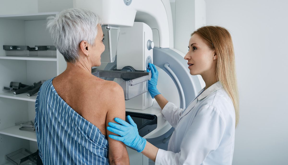 Woman undergoing mammography | Image credit: Peakstock - stock.adobe.com