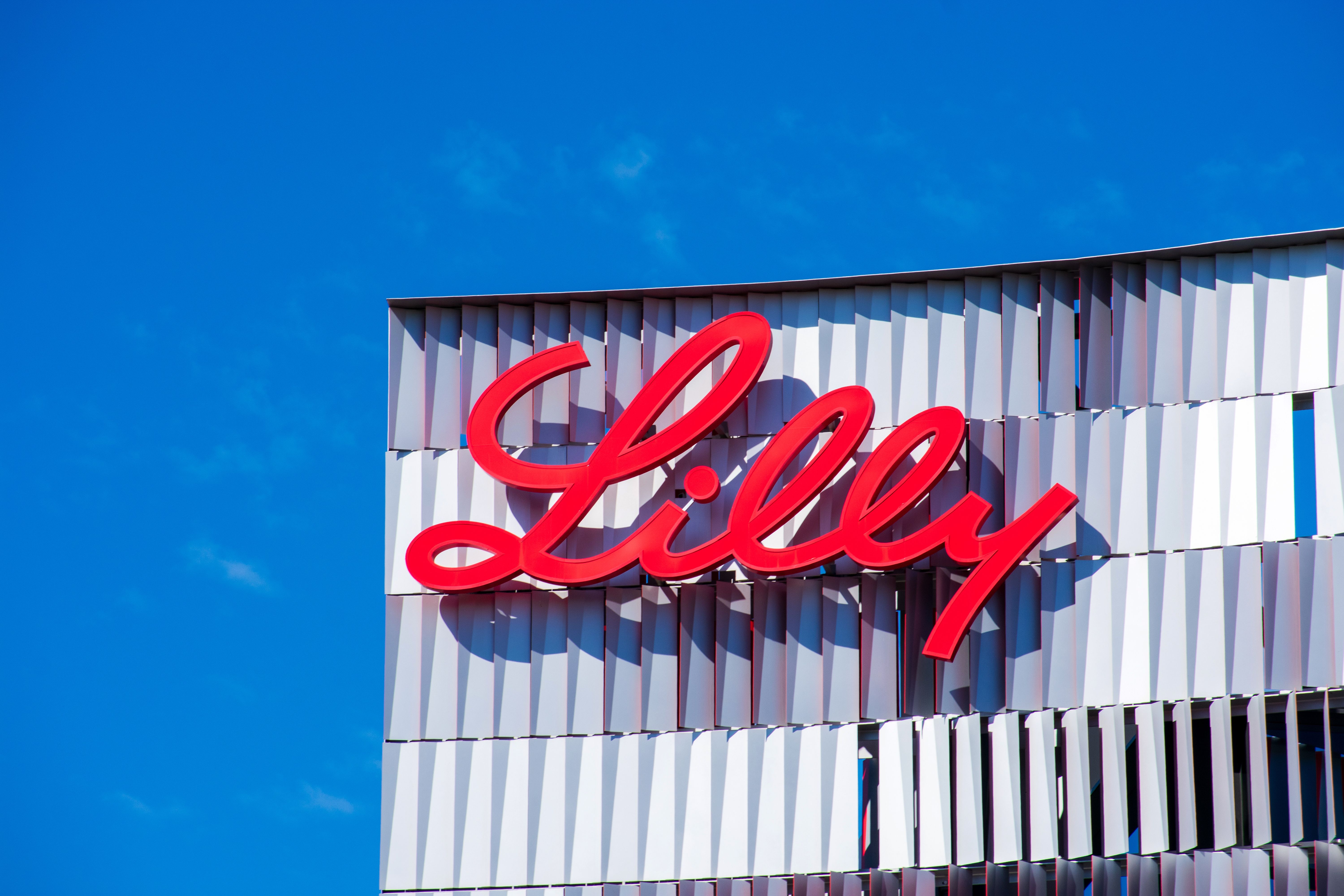 Eli Lilly logo on building | Image Credit: MichaelVi - stock.adobe.com