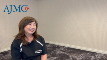 Eileen Peng, PharmD, sitting for a video interview