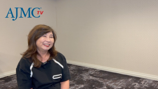 Eileen Peng, PharmD, sitting for a video interview