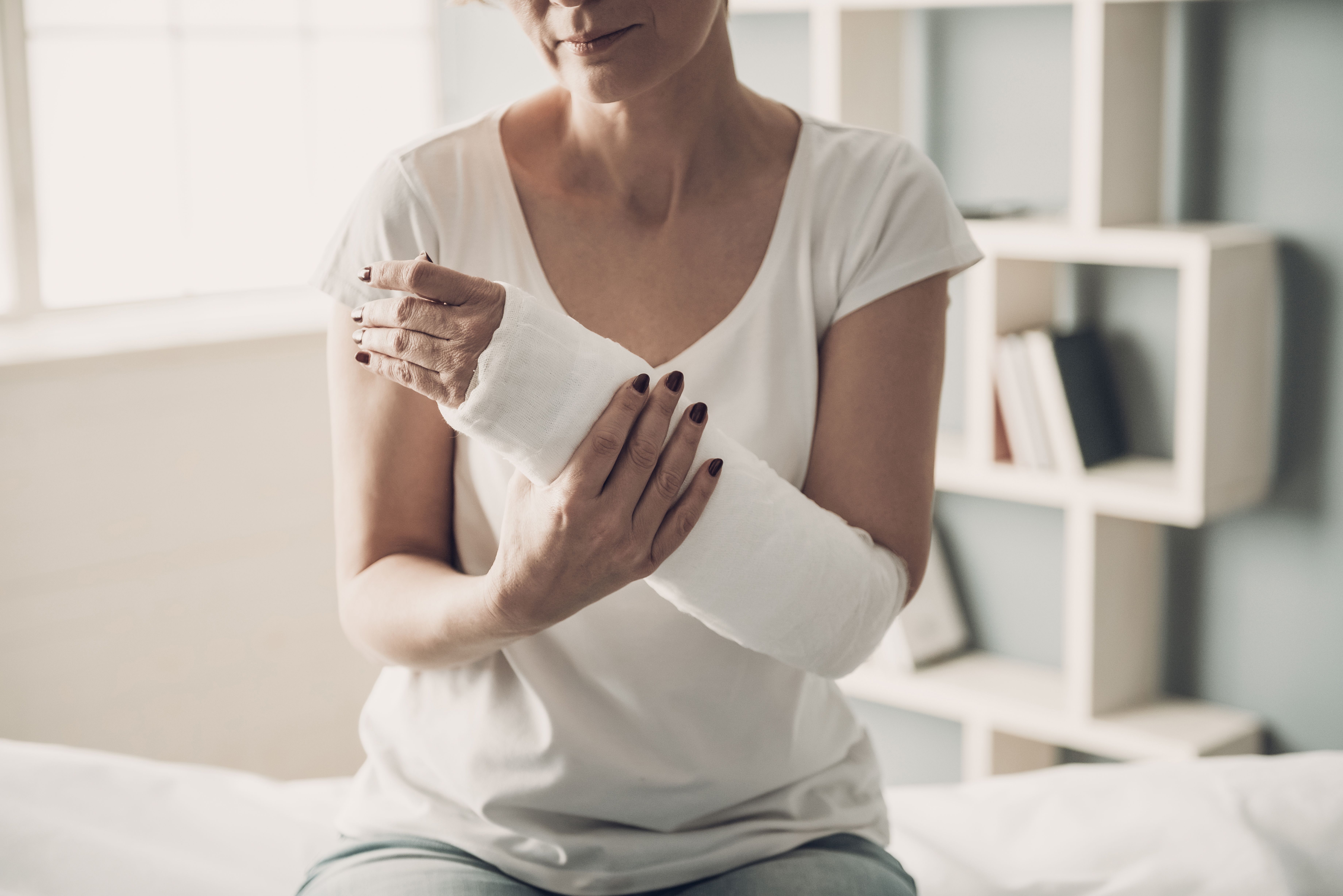 Female patient with arm cast | Image Credit: VadimGuzhva - stock.adobe.com