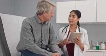 Doctor talking to older adult | Image credit: rocketclips - stock.adobe.com