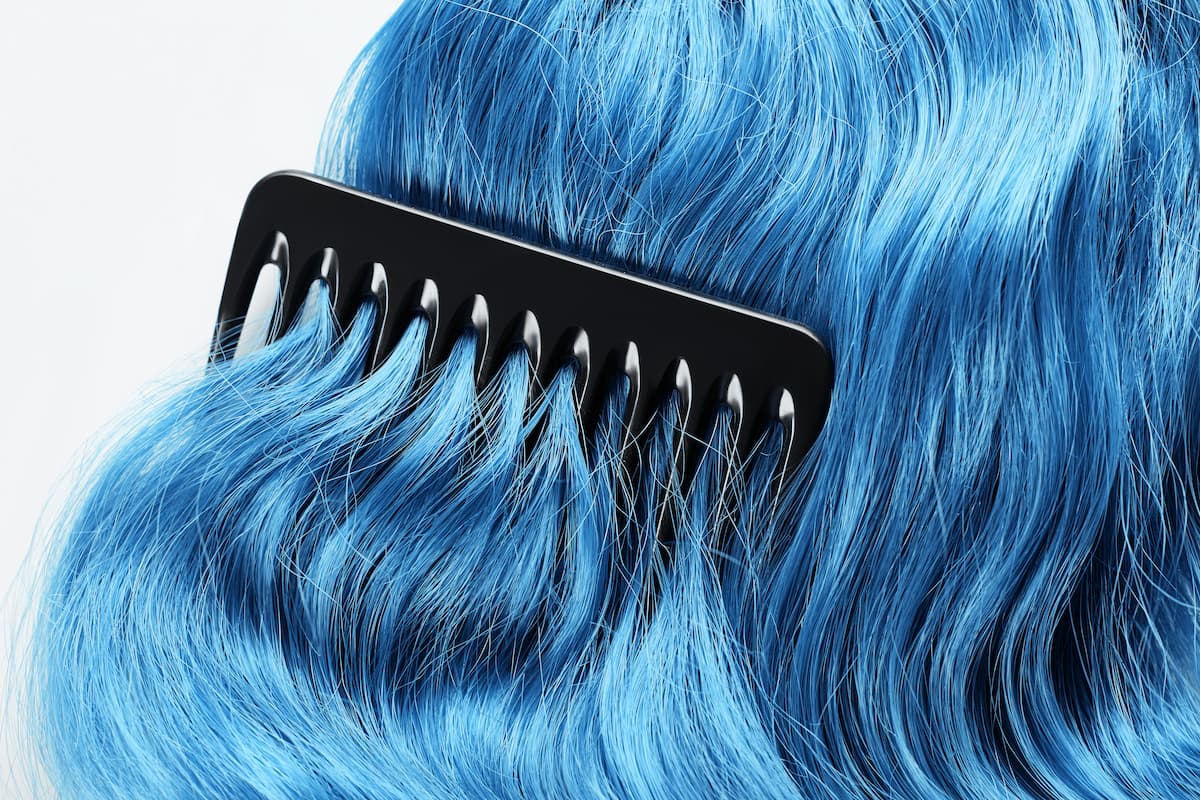 A woman's vibrant hair dye may have triggered myasthenic crises, a case study found. | Image credit: LIGHTFIELD STUDIOS - stock.adobe.com