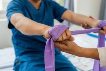 Patient using resistance bands at physical therapy | Image credit: NanSan – stock.adobe.com