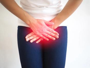 Woman with UTI | Image Credit: Bungon - stock.adobe.com