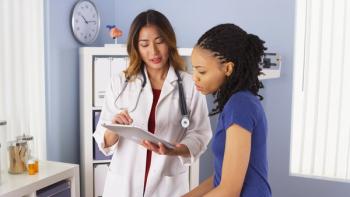 Provider speaking with patient | Image credit: rocketclips - stock.adobe.com